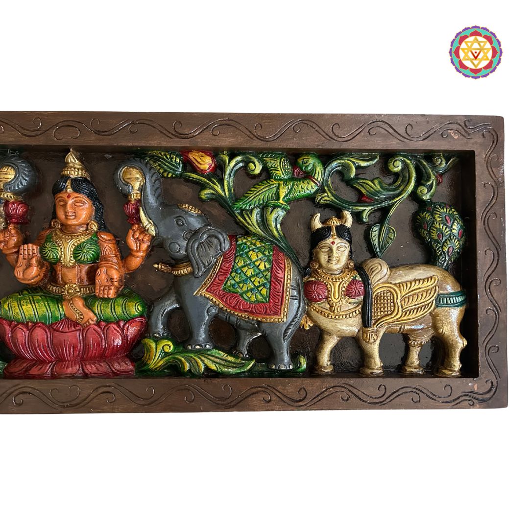 Close-up of multicolour Gajalakshmi wood panel in mahogany