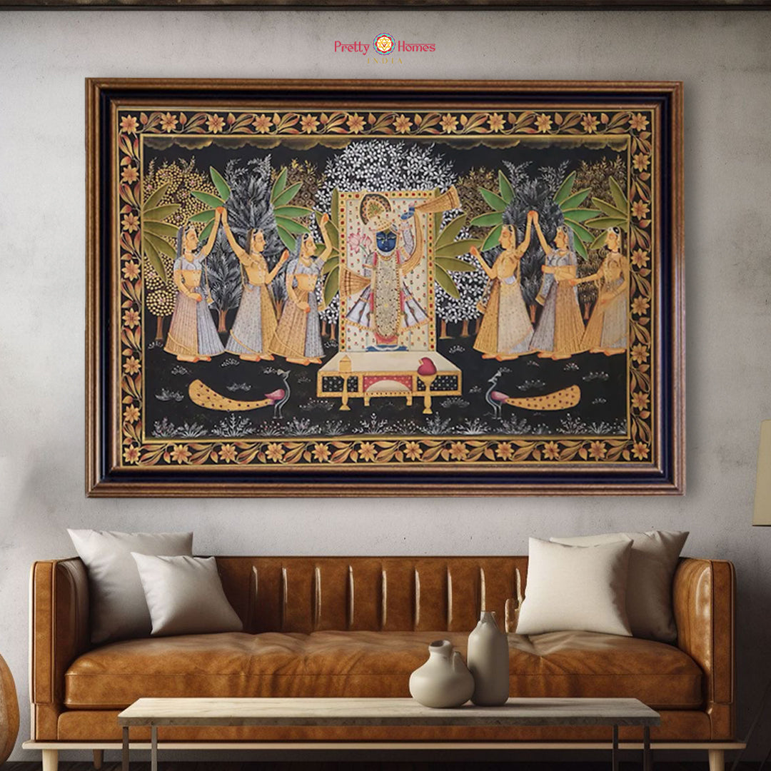 Traditional Shrinathji pichwai painting with gopikas, palm trees, and floral elements in symmetrical layout.