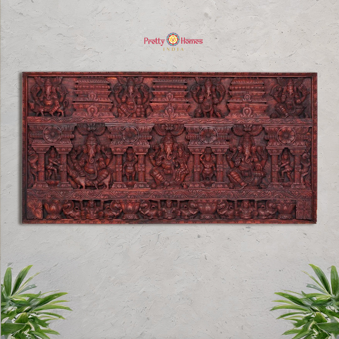 Full view of square wooden panel with Ganesha and Yali carvings