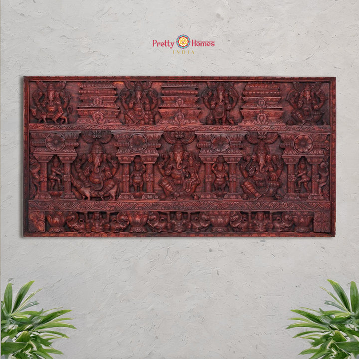Full view of square wooden panel with Ganesha and Yali carvings