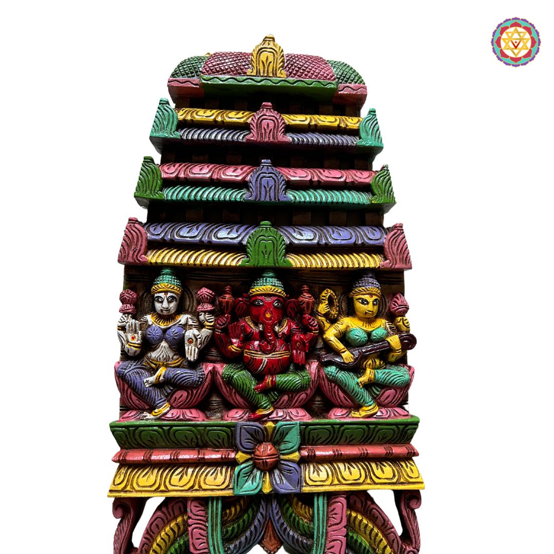 Side profile of triple deity wooden wall panel — fine carving and polished surface, Indian temple art