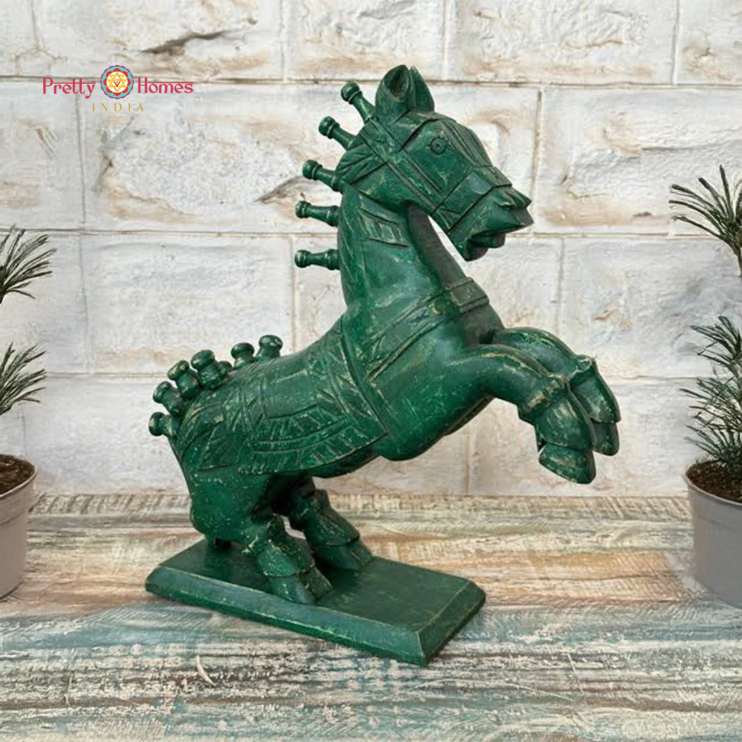 Side profile of artisan carved decorative wooden horse showing posture