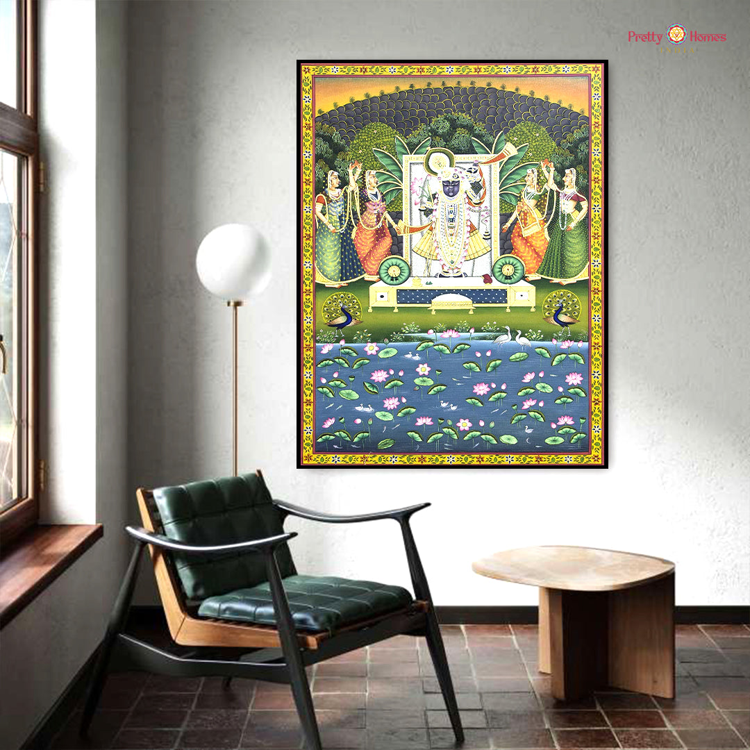 Pichwai painting of Lord Krishna with floral and peacock motifs in vibrant traditional colors