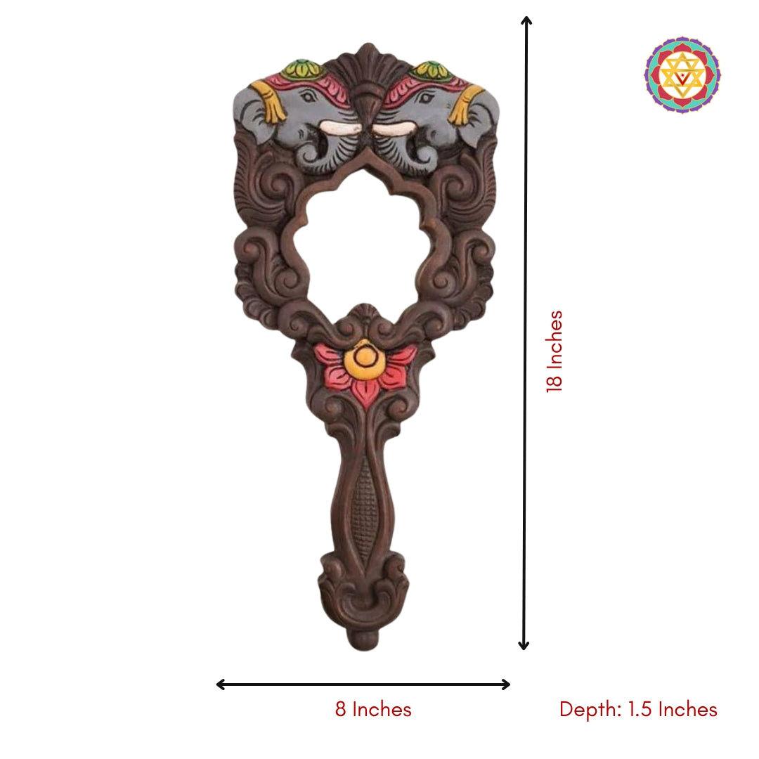 Wall hanging wooden mirror with carved elephant design and decorative detailing