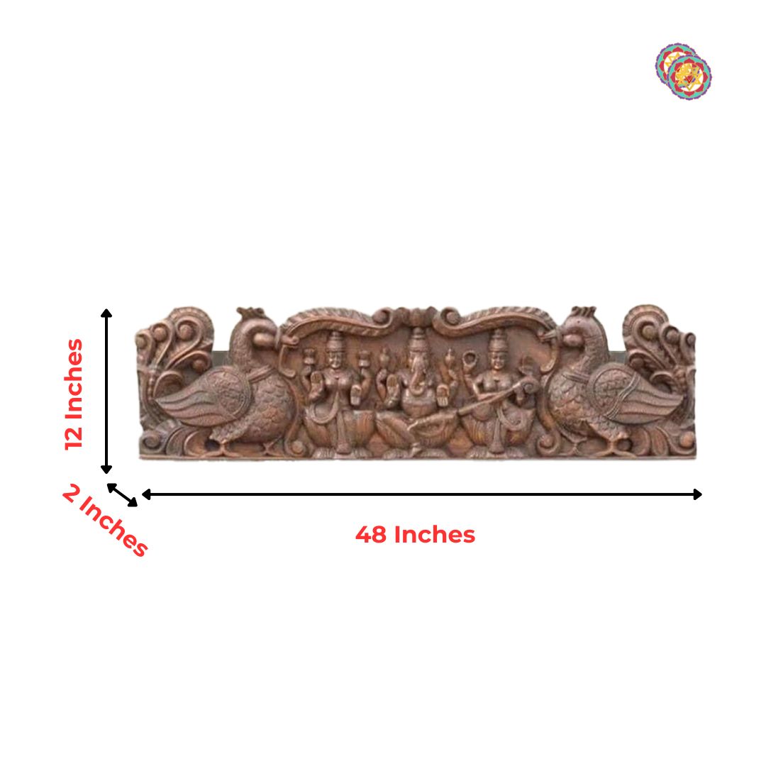 Indian pooja wall panel — wooden carving of divine deities.