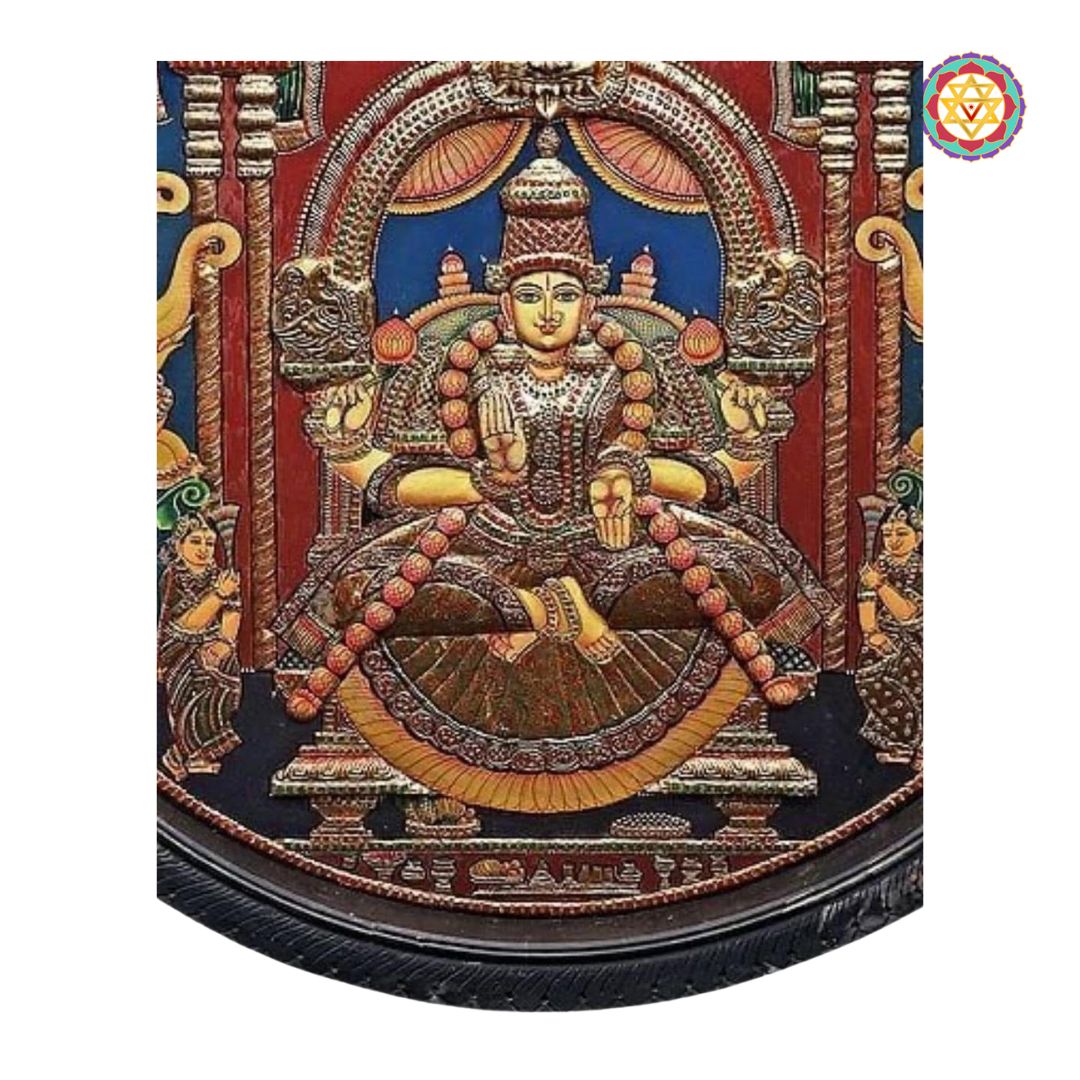“Gajalakshmi Tanjore painting showing elephants, peacocks, and divine aura in 22-carat gold foil”