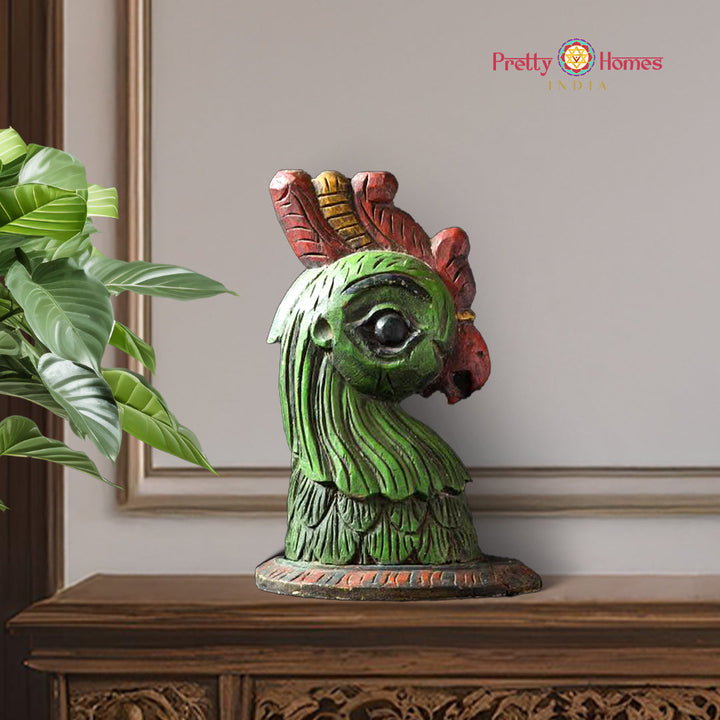 hand-carved annapakshi wooden table top with detailed bird head design