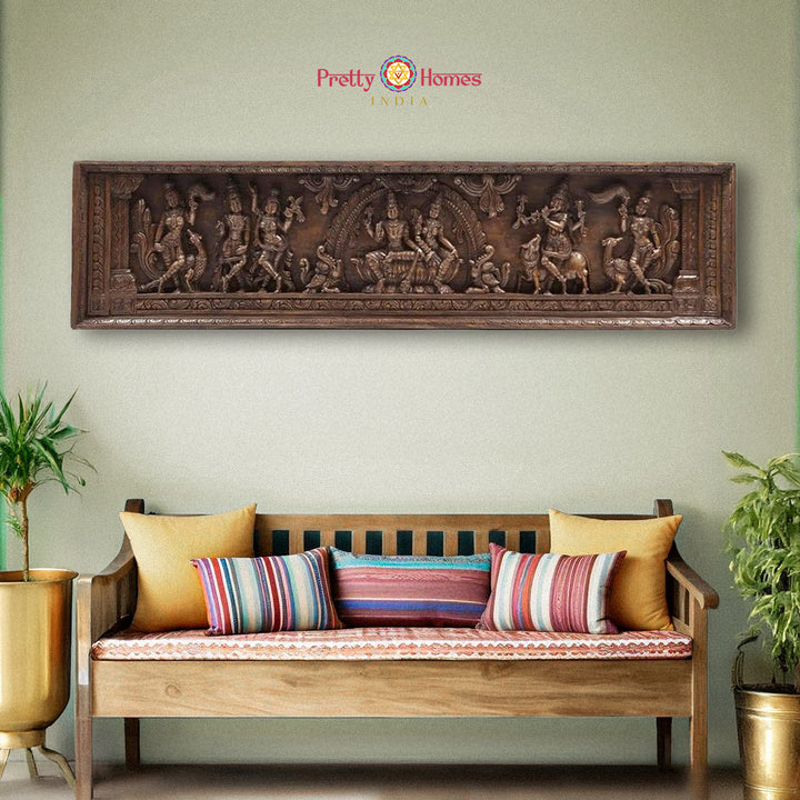 Wide wooden carved wall panel of Vishnu and Lakshmi with Krishna and peacocks