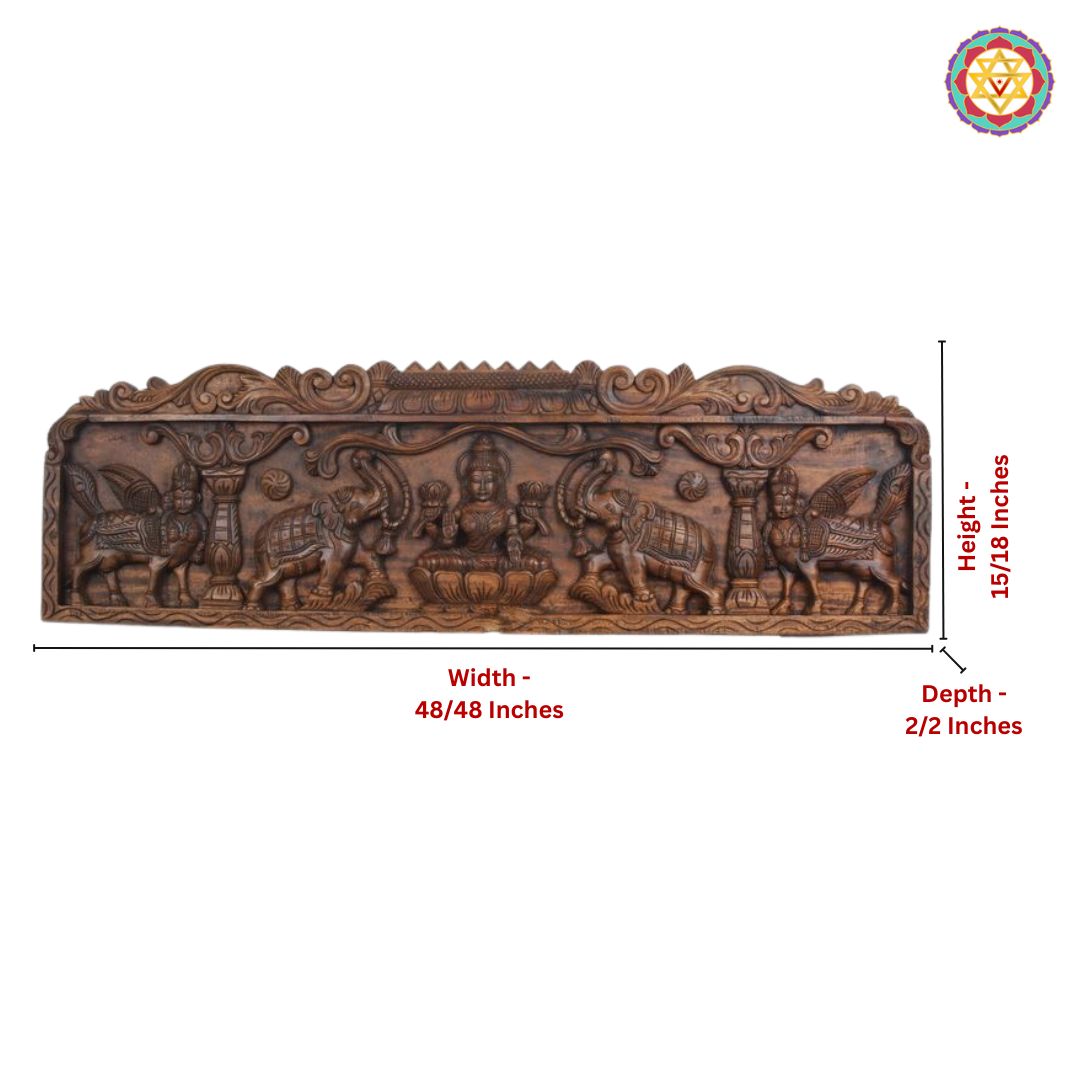 horizontal gopuram style carved gajalakshmi with kamdhenu panel close-up capturing fine carving and traditional detailing