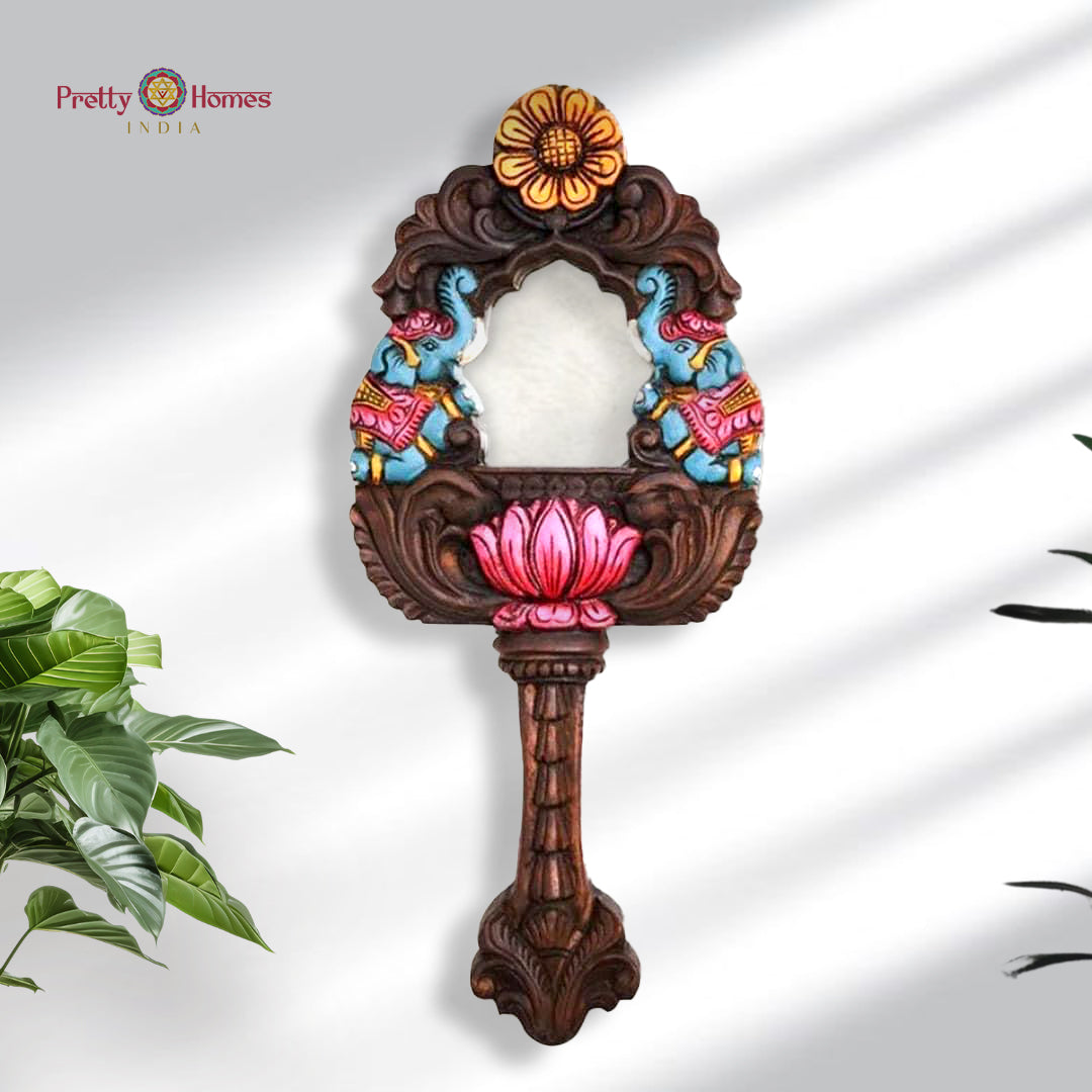 Handcarved wooden mirror frame with twin painted elephants