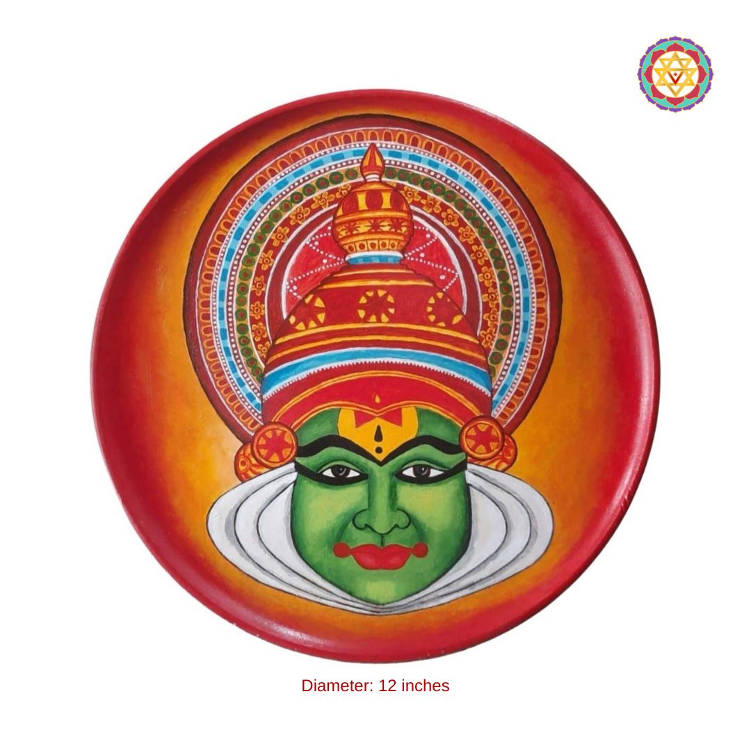 close-up of kathakali face detailing in kerala mural wall plate