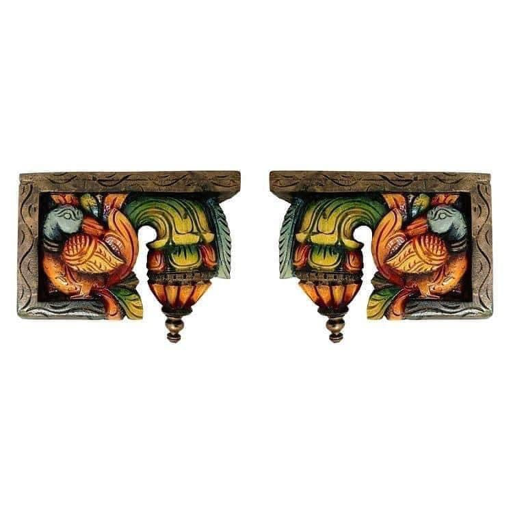 Side profile of wooden bodhil bracket showing fine floral carving and hand-polished edges