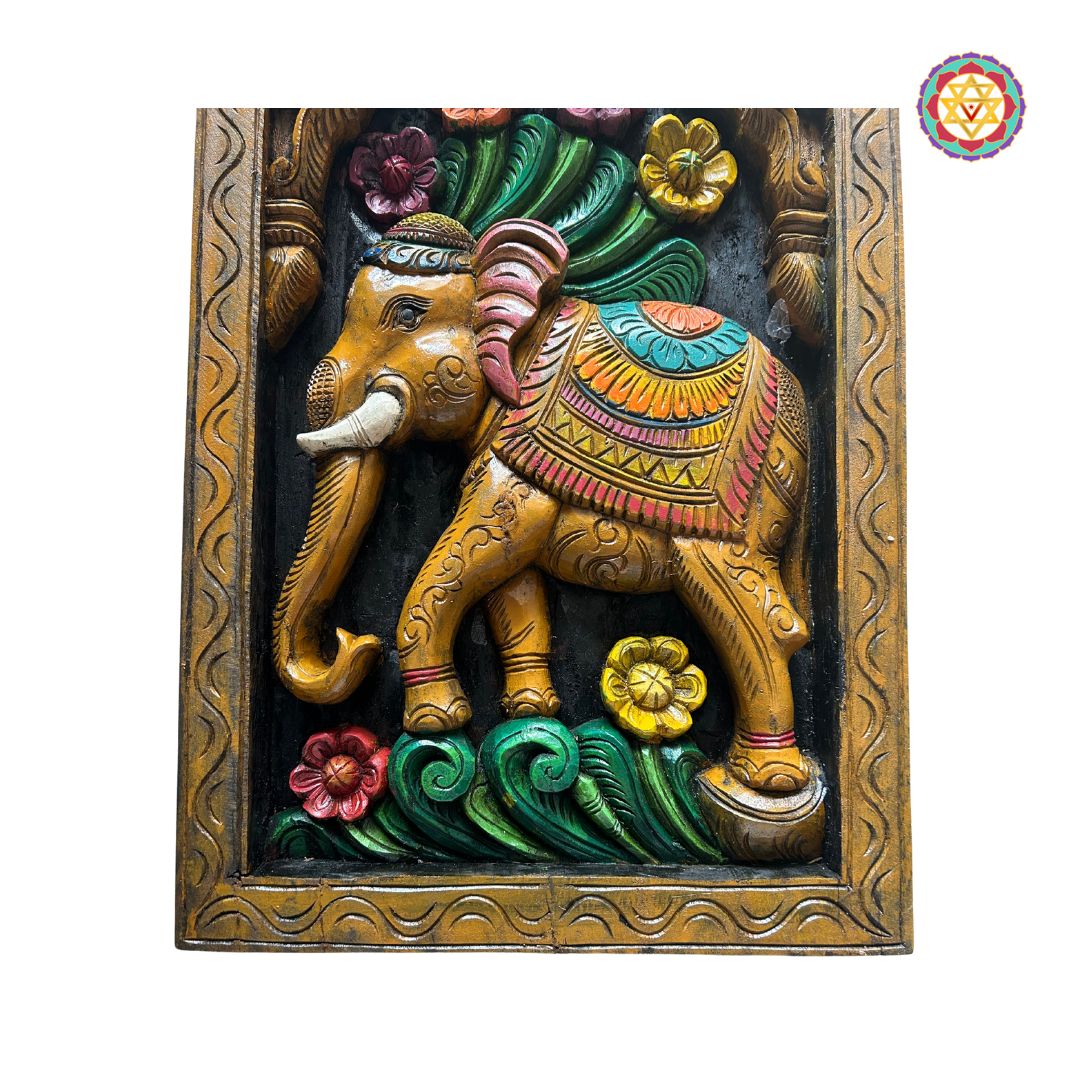 Close-up of floral border work and elephant trunk carving