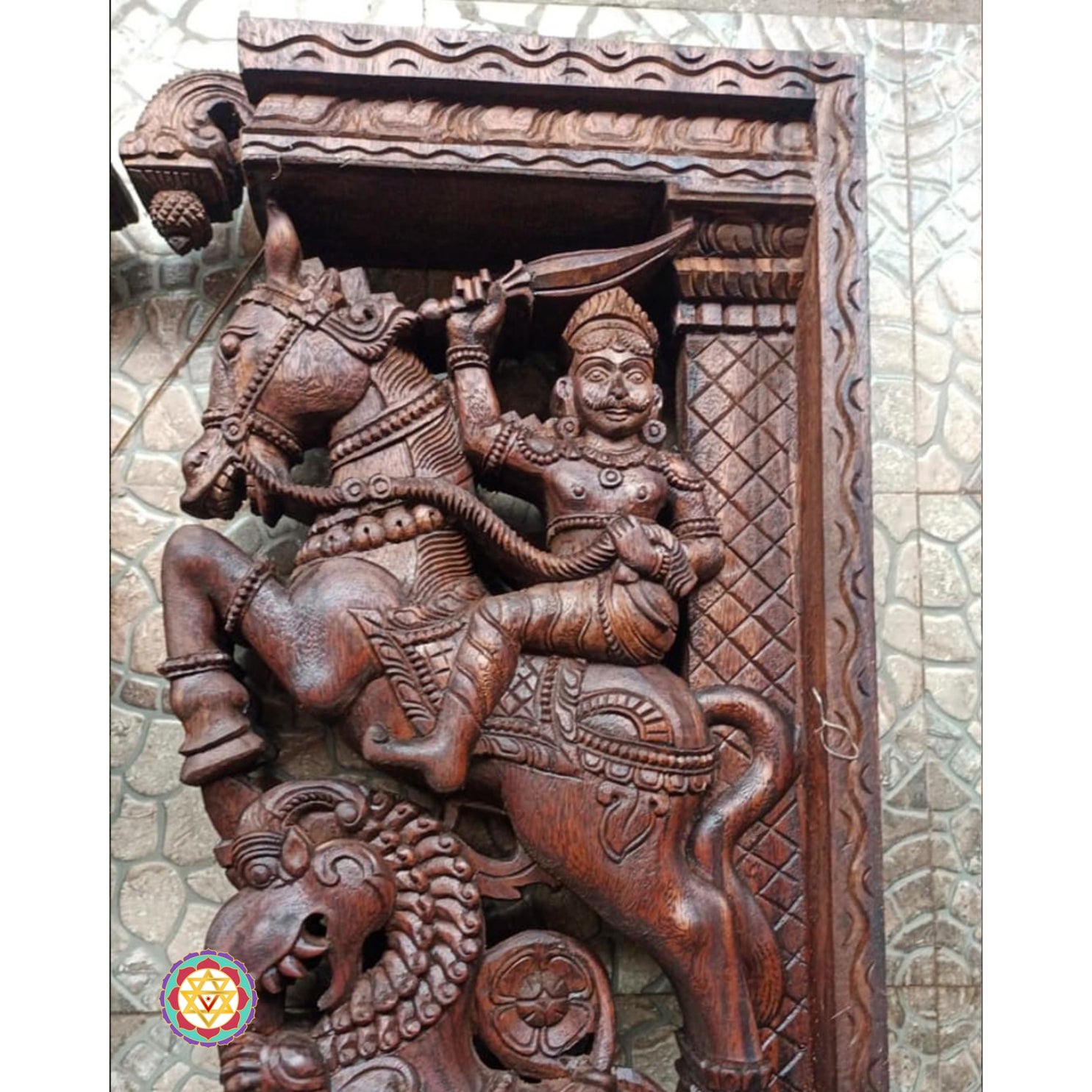 Close-up of woodcarved wall bracket showing yali and elephant carving details — handcrafted Indian wall decor pair