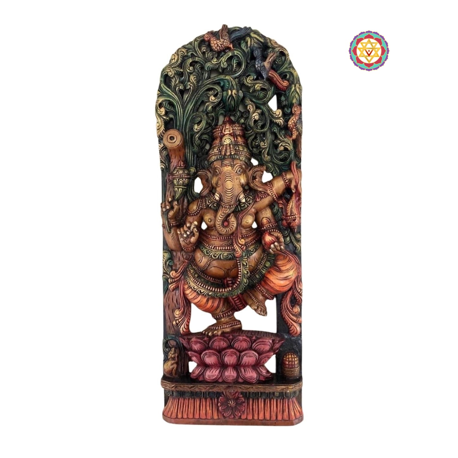 Close-up of Ganesha canopy statue showing expressive face, jewelry, and lotus carving — artisan wooden temple decor
