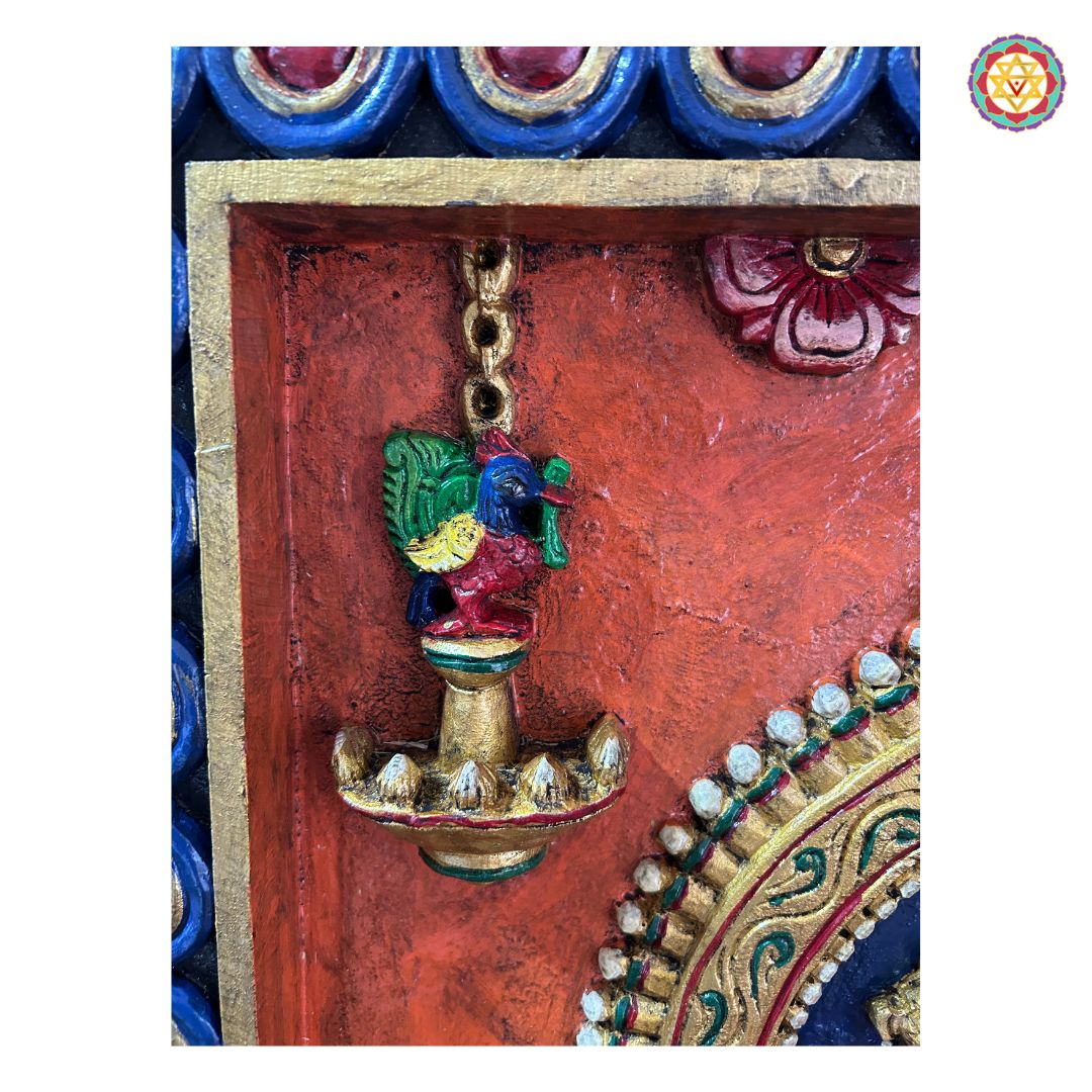 Angled view of Lalitha Tripura Sundari wooden panel — divine carving on teak wood with rich gold brown finish