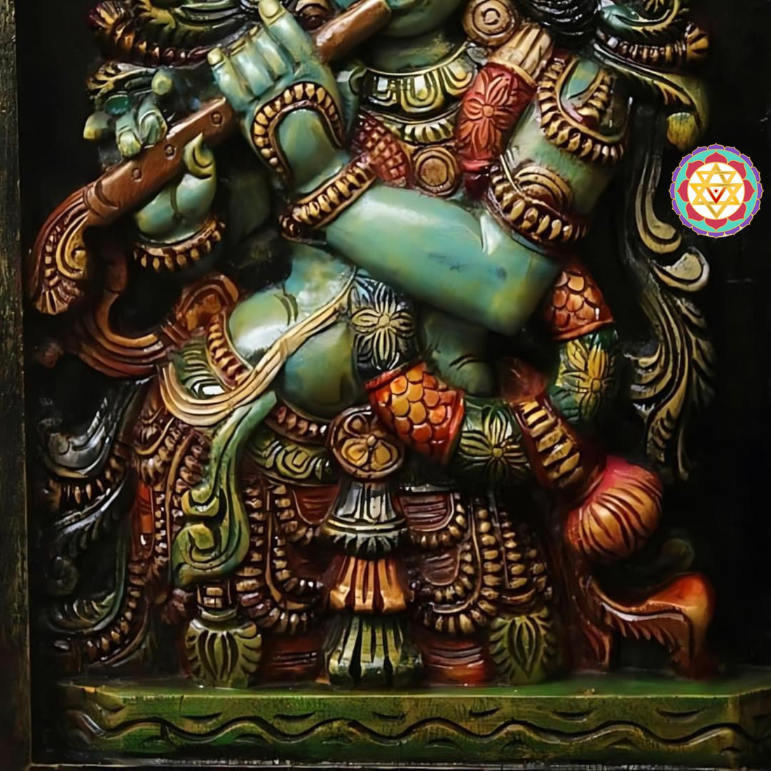 Close-up of Krishna’s face with polychrome paint detailing