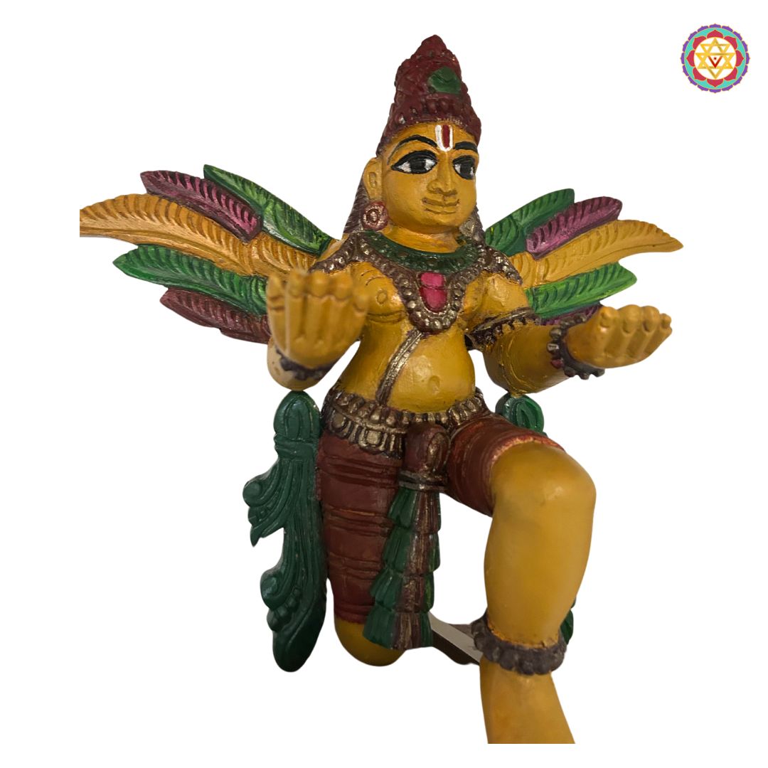 Angled view of meditating Garuda sculpture — teak wood carving with polished antique surface for traditional Indian interiors