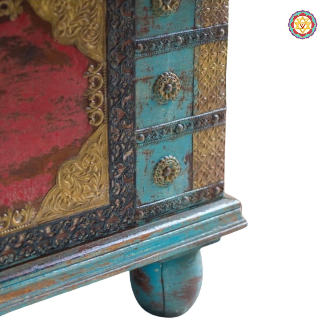 Top view of wooden trunk with brass design — antique handcrafted furniture piece with painted ethnic motifs