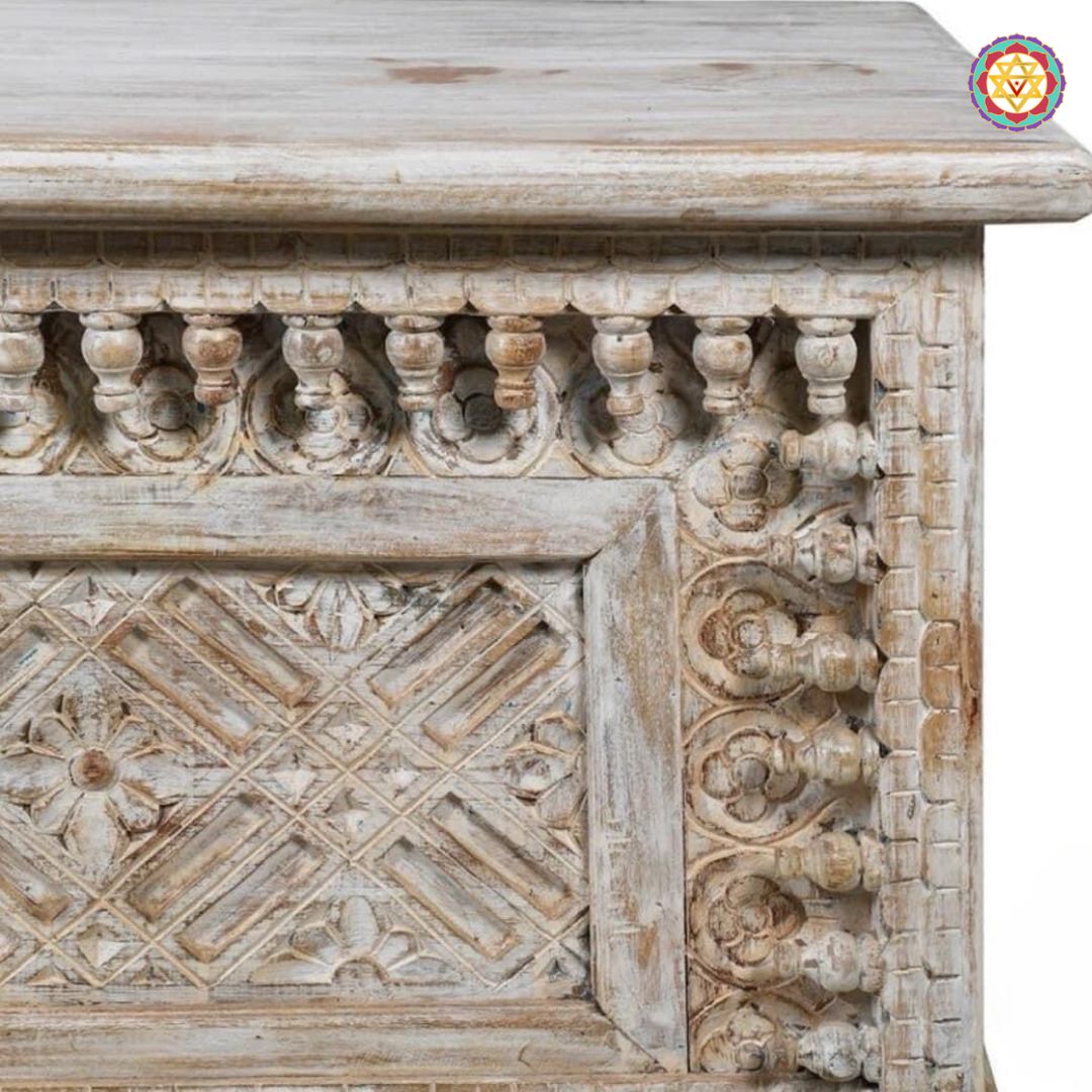 Close-up of wooden trunk box — spindle pattern carving, teak wood craftsmanship with antique brown gold tone finish