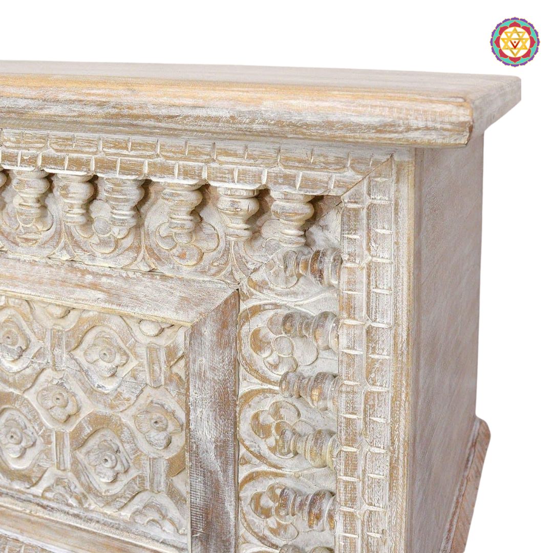Front view of spindle-style wooden trunk — detailed carving on panels, rustic polish finish for living room decor