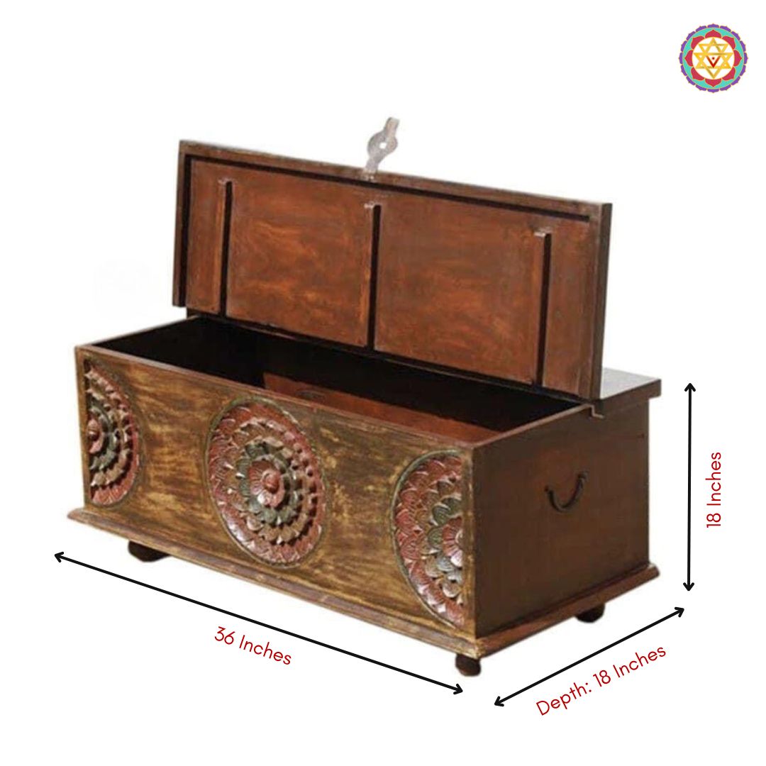 Angled view of wooden ethnic storage trunk — teak wood craftsmanship with antique gold brown polish finish
