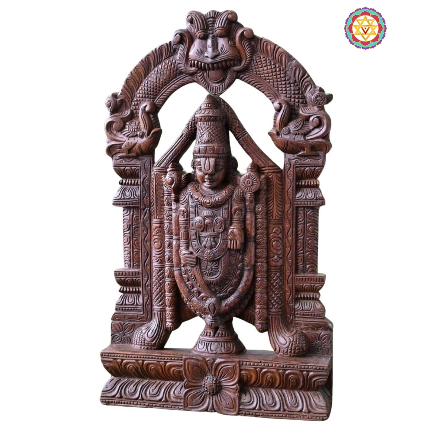 Close-up of wooden Balaji statue showing detailed crown, ornaments, and facial features — artisan hand-polished temple sculpture