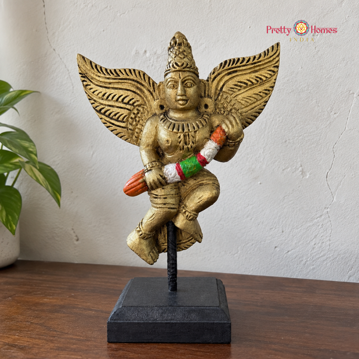 Woodcarved Gandharva with Garland