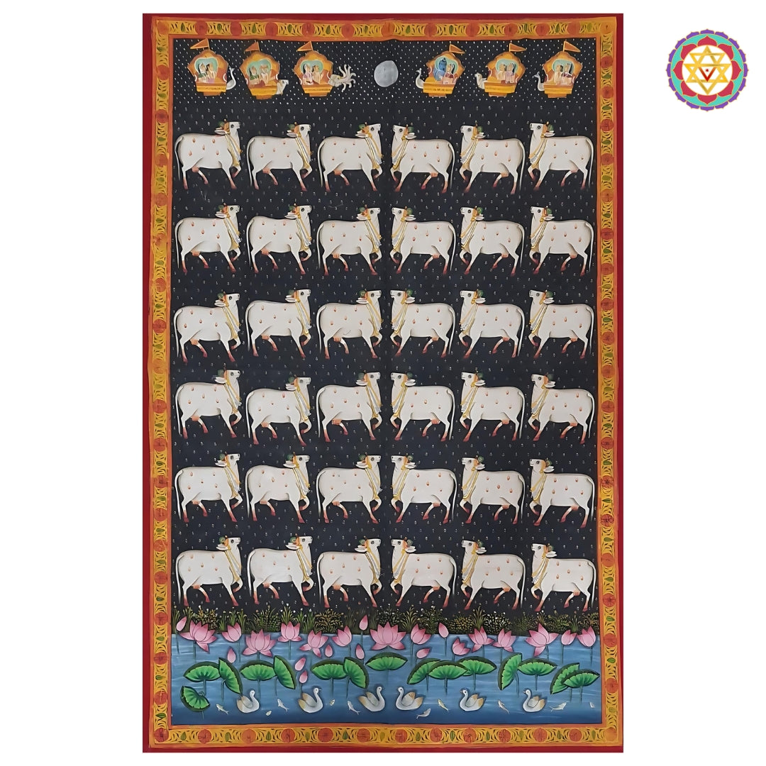 Living room setup featuring framed Pichwai paintings and modern Indian décor