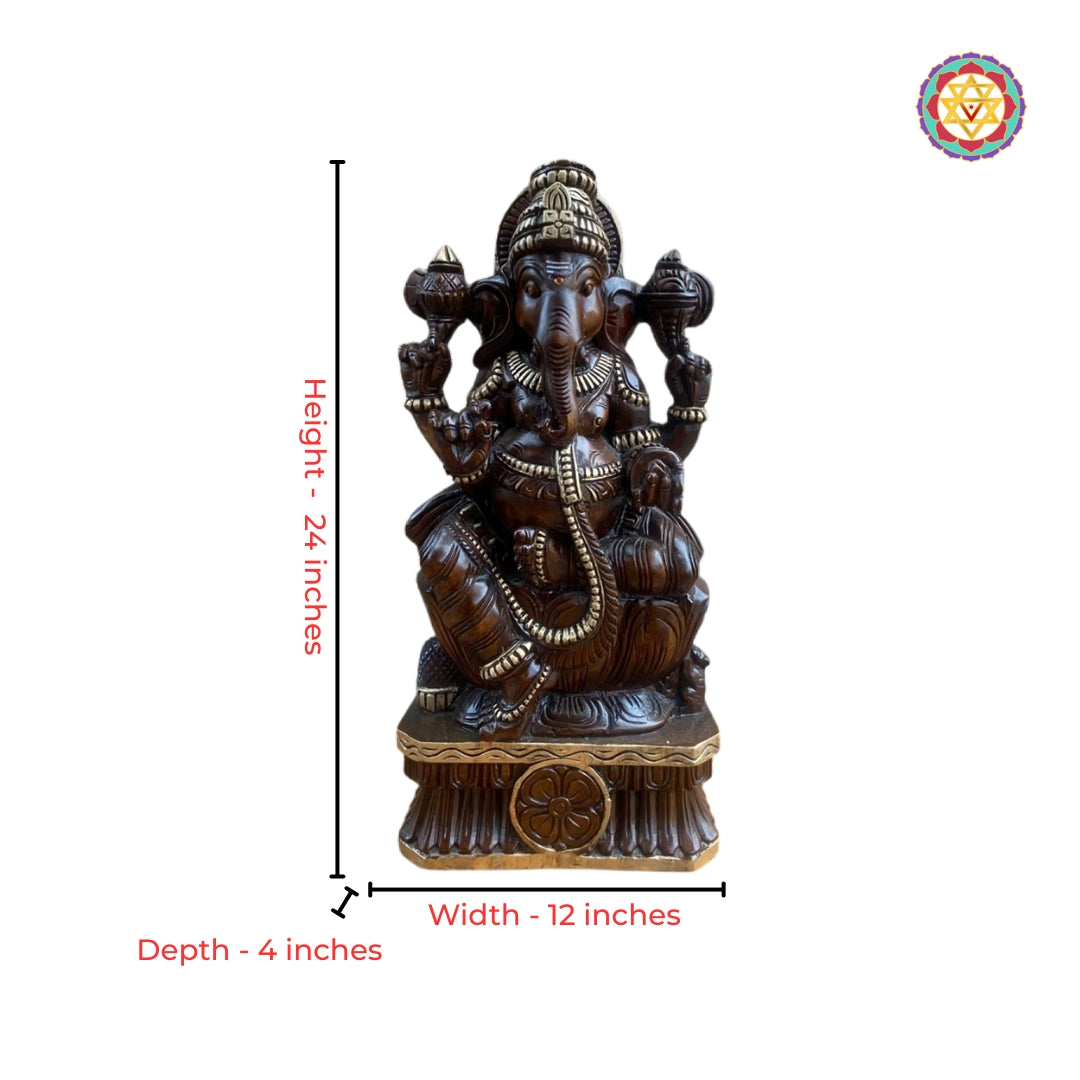 Close-up view of antique gold Ganesha carving with intricate sacred detailing