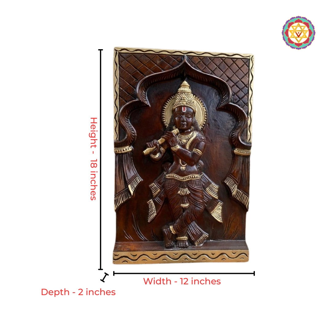 Close-up view of flute Krishna carving with antique gold temple-style detailing
