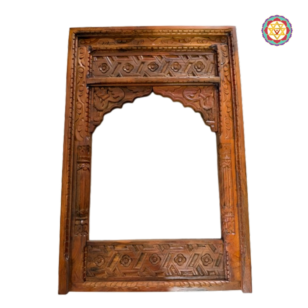 Side detailing of intricately carved wooden jharokha heritage frame