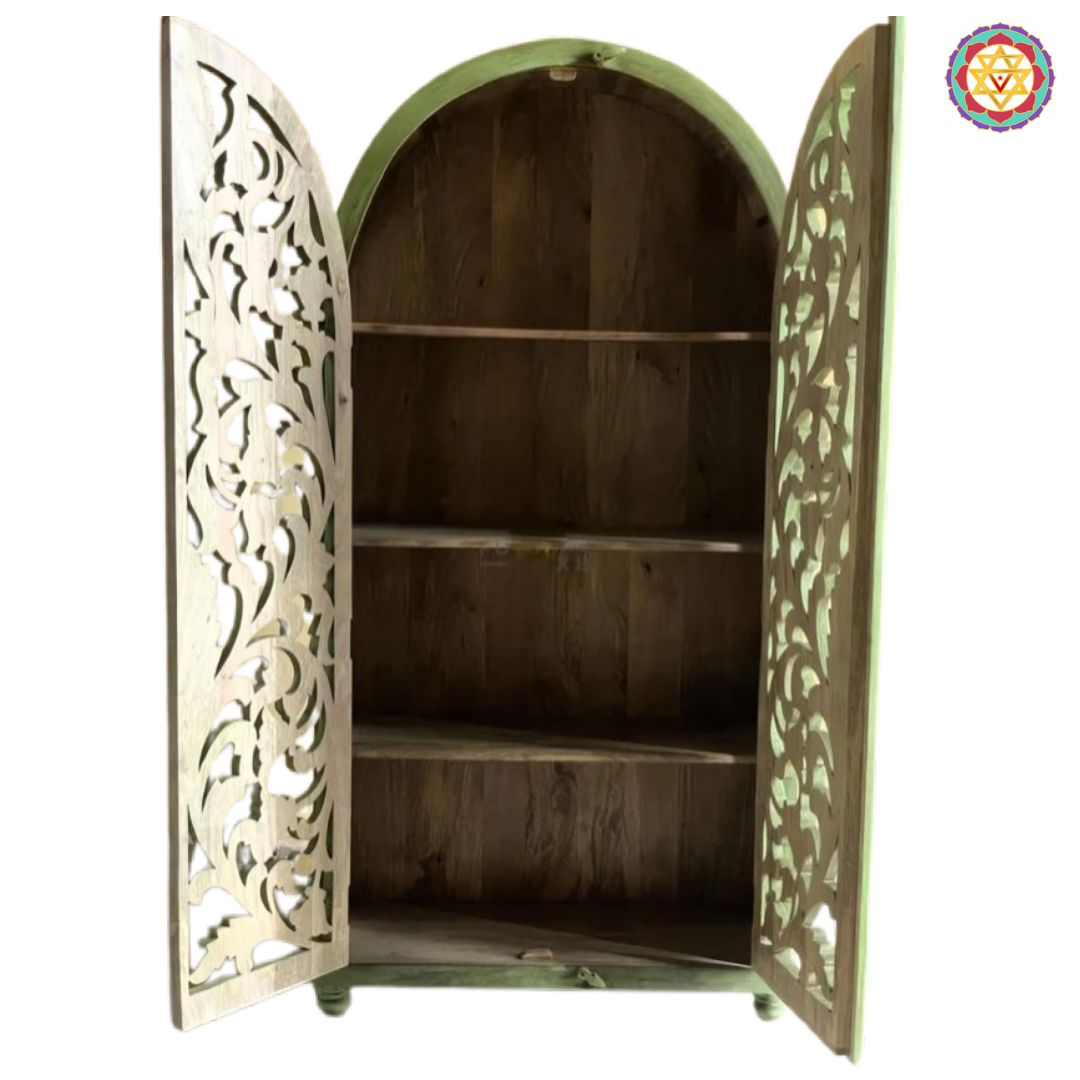 A tall arched hand-carved solid wood wardrobe in a unique rustic green finish.