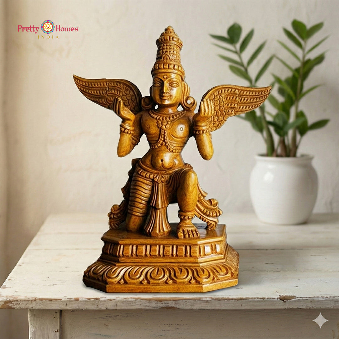 Woodcarved pair of Rathi and Manmadhan statues symbolising love and divine grace