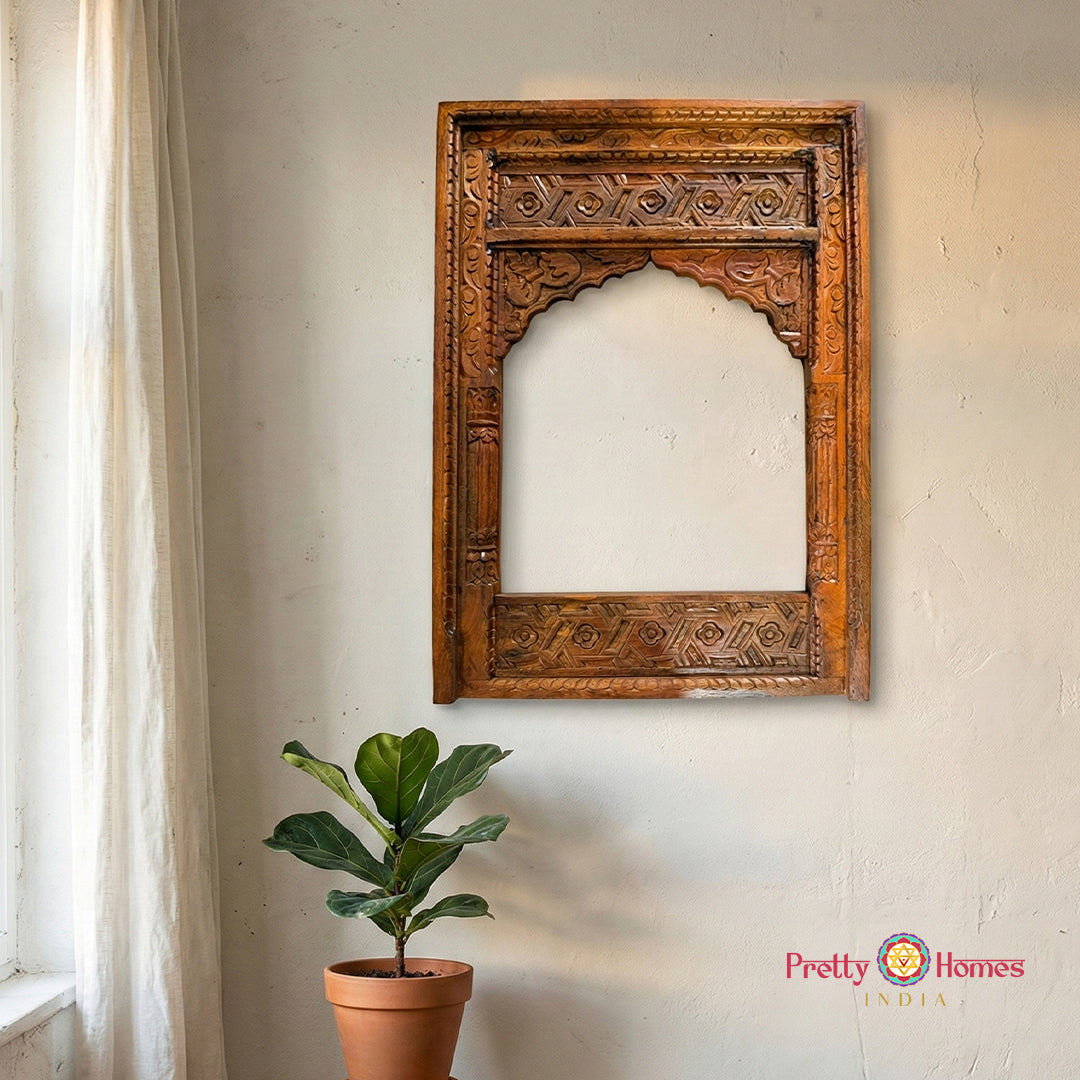 Intricately carved wooden jharokha frame inspired by traditional palace windows
