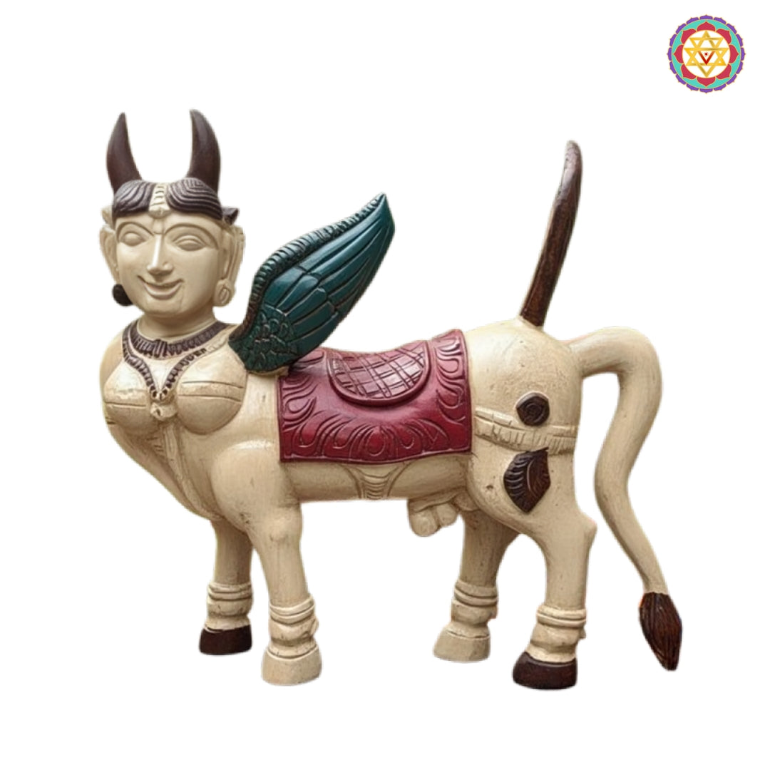 Detailed handcrafted Kamadhenu statue with traditional divine carving