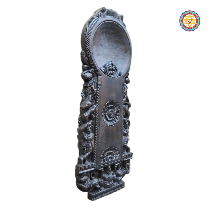 Close-up detailing of Chettinad woodcraft panel with intricate carved patterns