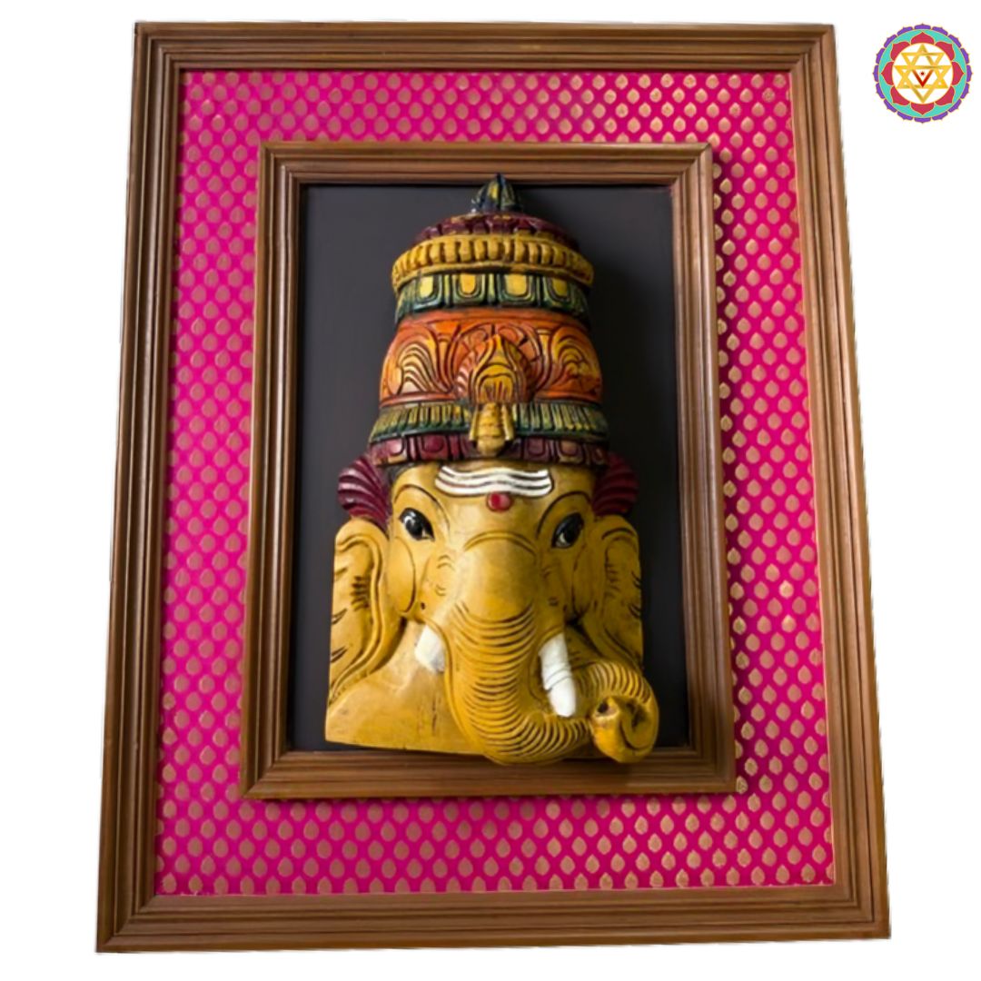 ganesha wall decor wooden carved face with dusty rose background