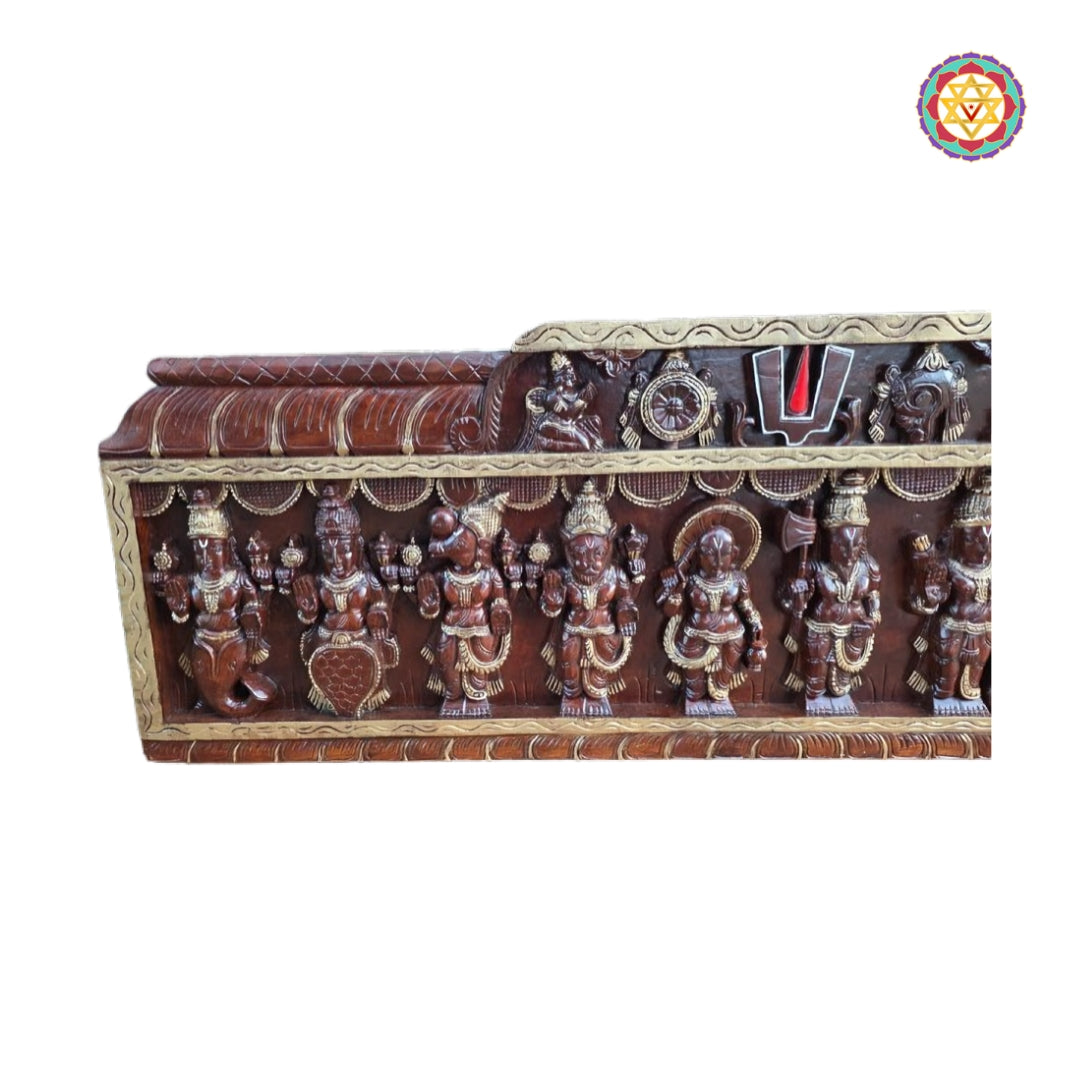 Close-up detailing of Vishnu Dashavatars figures in carved wooden wall panel