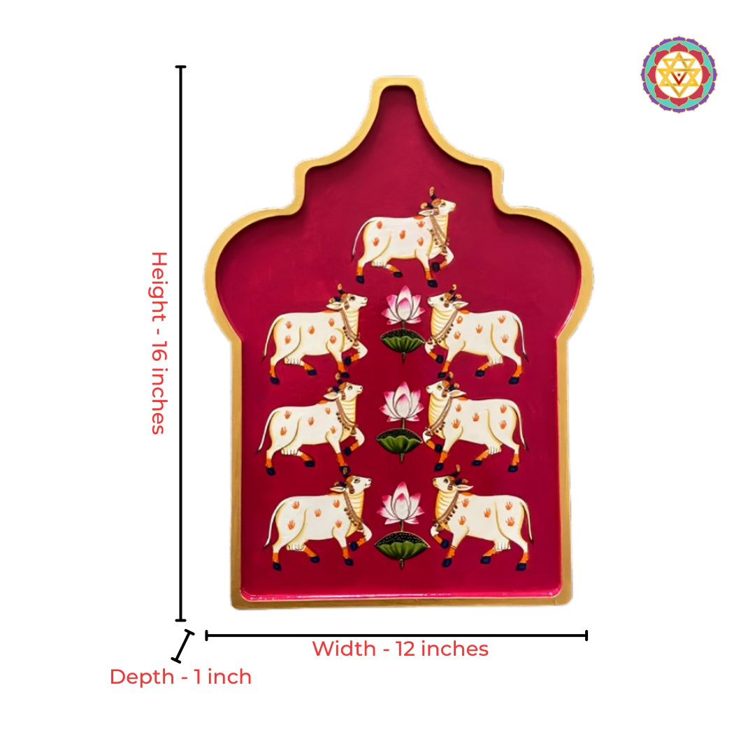 Close-up detailing of cow lotus arabesque pichwai wooden wall decor plate