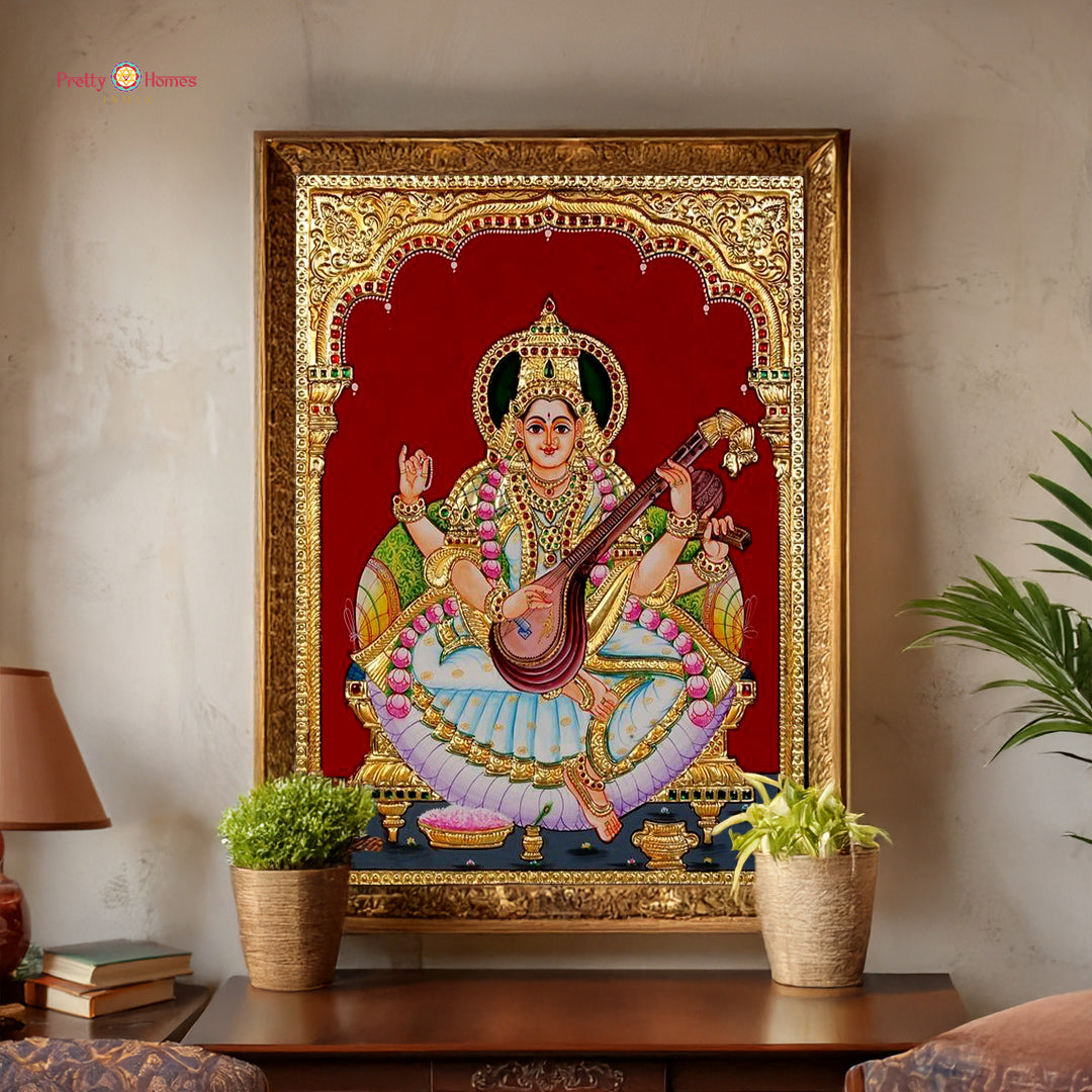Hand painted paintings of Goddess Saraswati in Tanjore style.