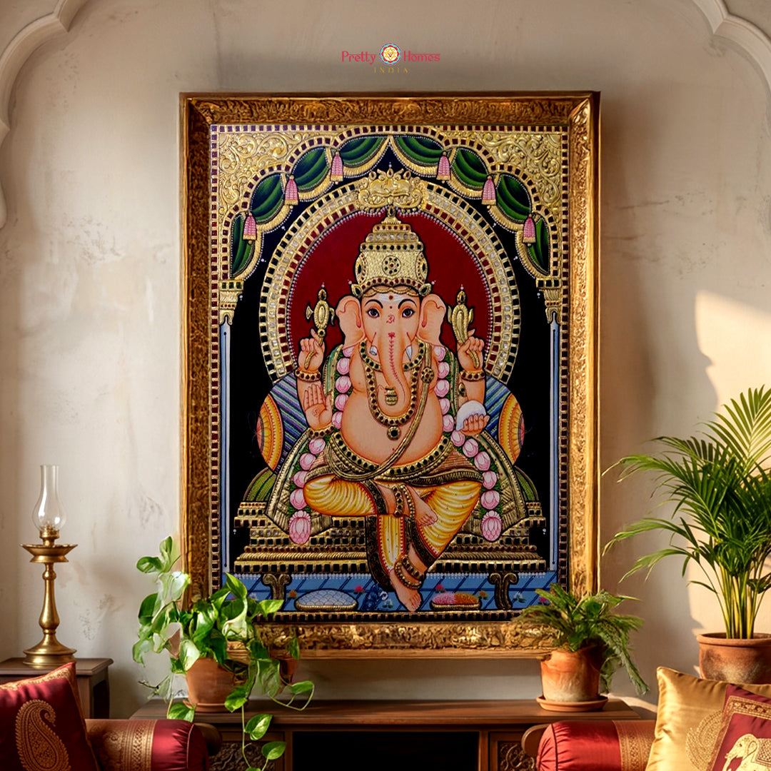 Hand painted paintings of Lord Ganesha in Tanjore style.