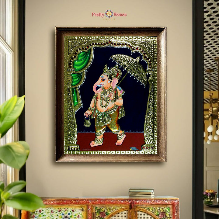 Hand painted paintings of Umbrella Ganesh in Tanjore style.
