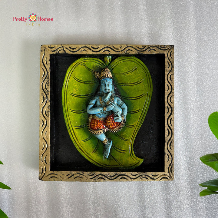 hand carved wooden baby krishna wall plaque
