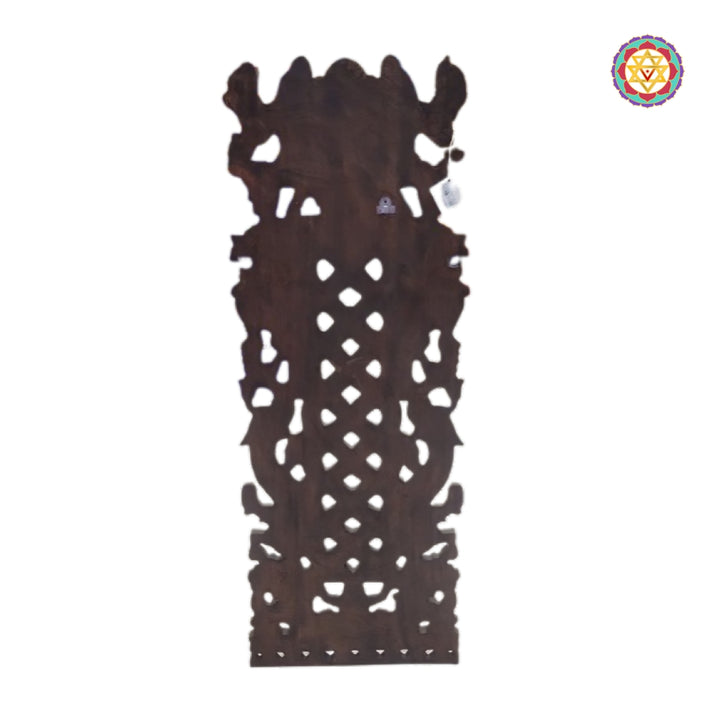 Close-up detailing of traditional Chettinad spoon wall hanging wooden panel