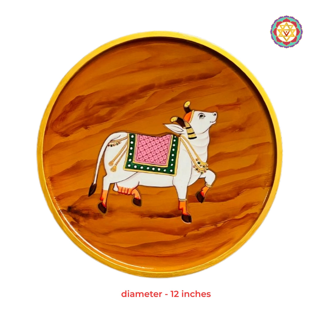 Traditional Pichwai cow decorative wall plate handcrafted with rich wooden finish for heritage interiors