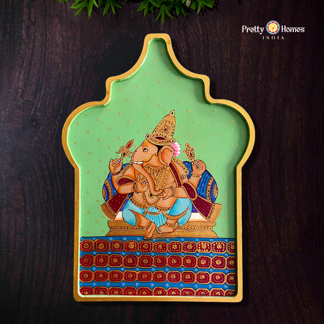 Arabesque hand-painted Ganesha wooden wall plate with traditional sacred design