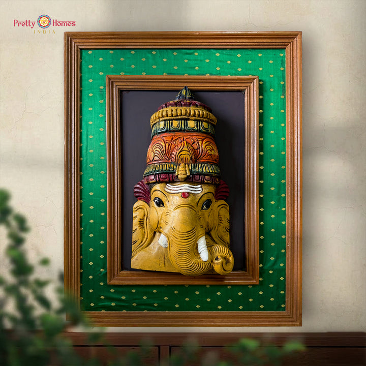 lord ganesha wooden face wall hanging with golden frame