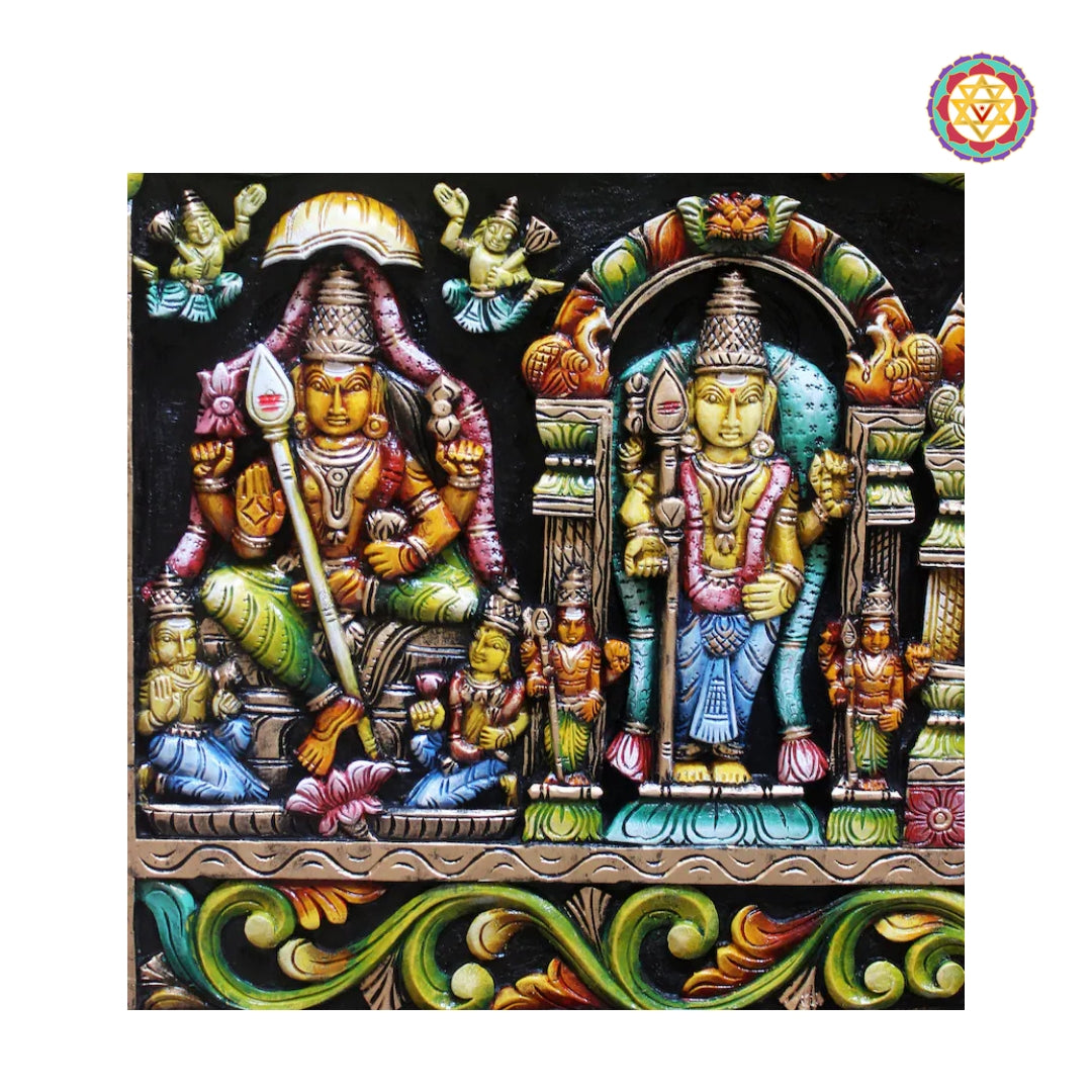 Close-up detailing of Lord Murugan carving on horizontal wooden wall panel