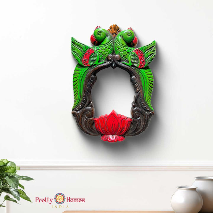 handcarved mahogany wood wall frame with colourful parrots